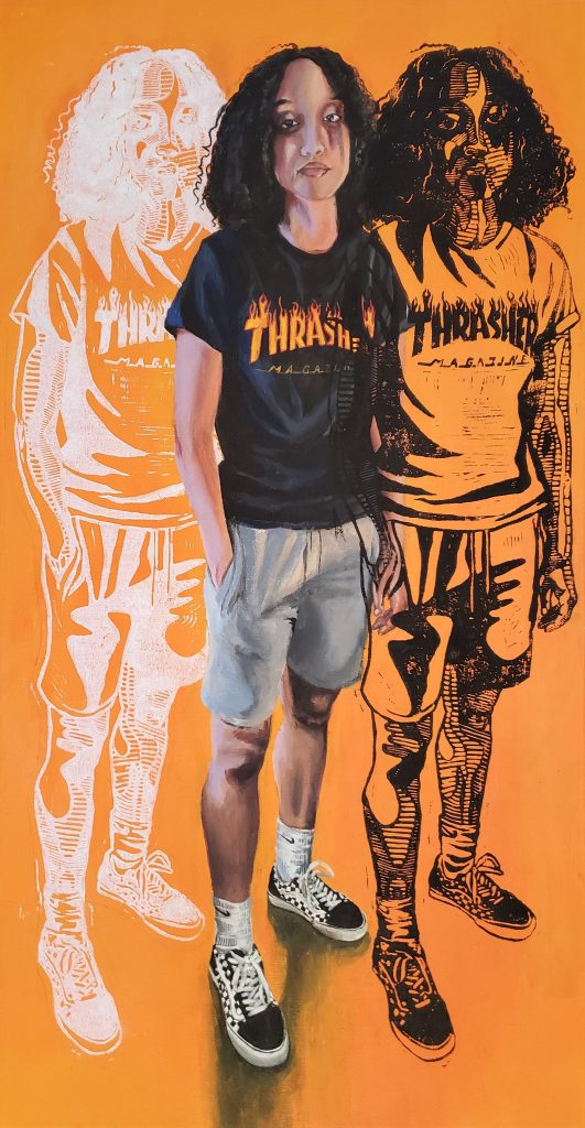 A person in a t-shirt that says "Thrasher" on an orange background.