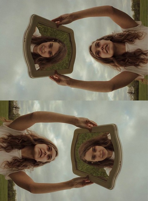 Two photos of a girl holding up a mirror and looking into it